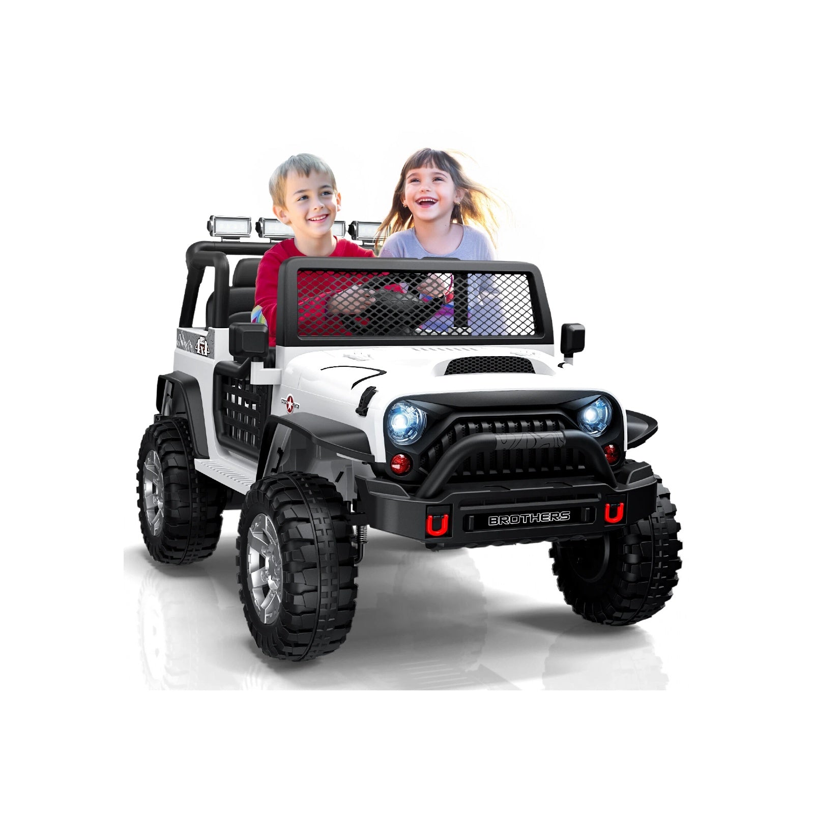 Children sitting in a white and black off-road ride-on car on a white background