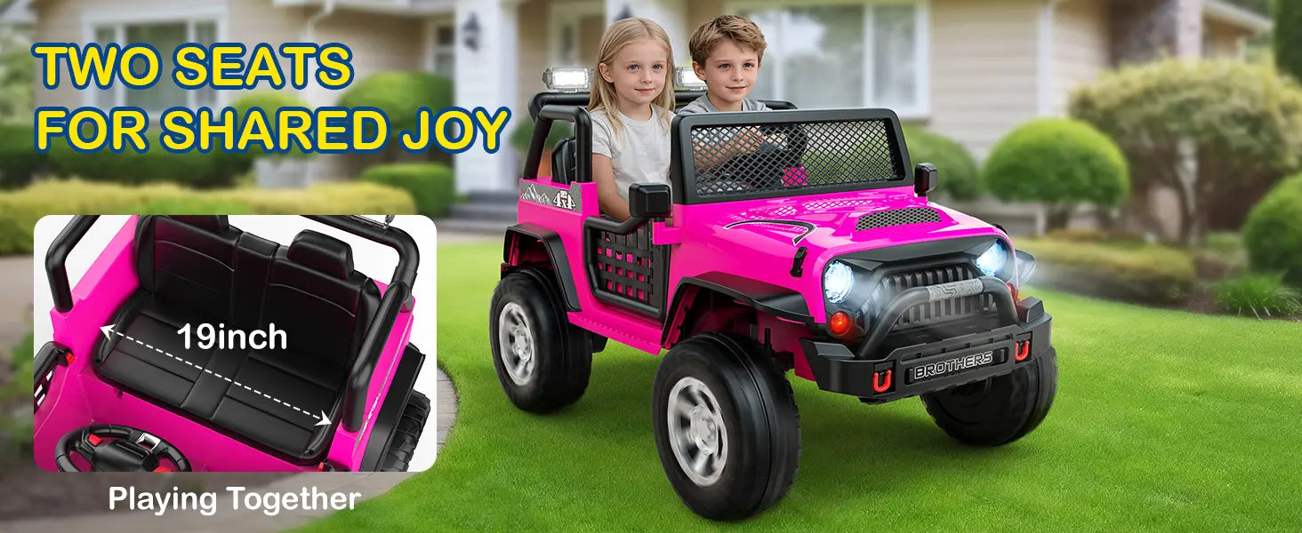 Two children sitting in a 2-seater pink ride-on car